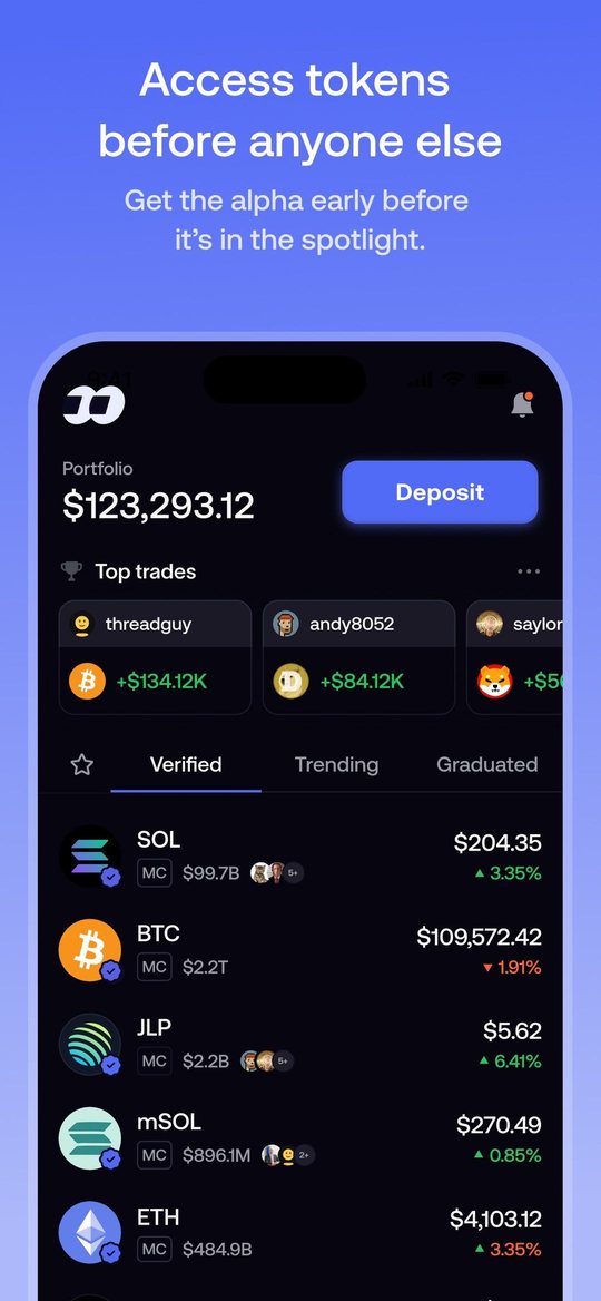 Fomo iPhone home: portfolio balance, Deposit button, top trades and the verified token list
